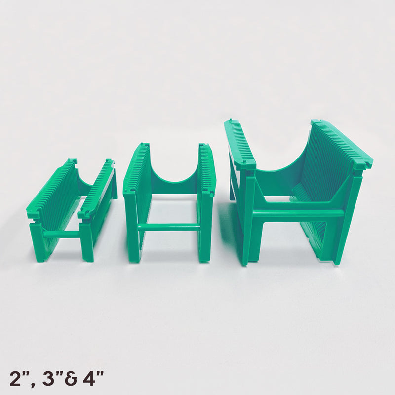 Front view of three green polypropylene semiconductor cassette with 25 wafer slots