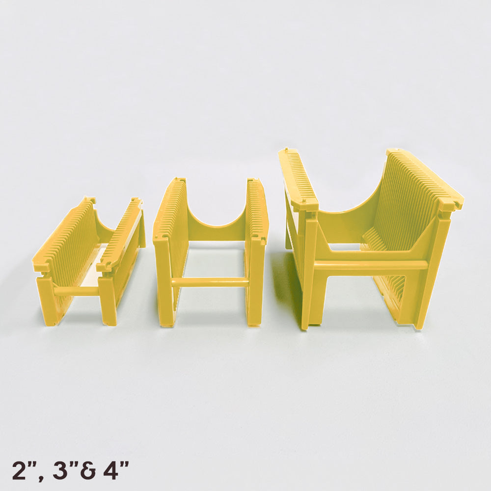Front view of three yellow polypropylene semiconductor cassette with 25 wafer slots