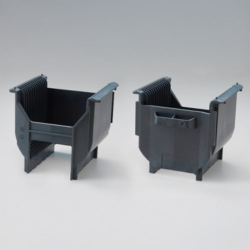 Front and back of 13 slot cassette with BI-PITCH made from e-mateX®FB-0437 material