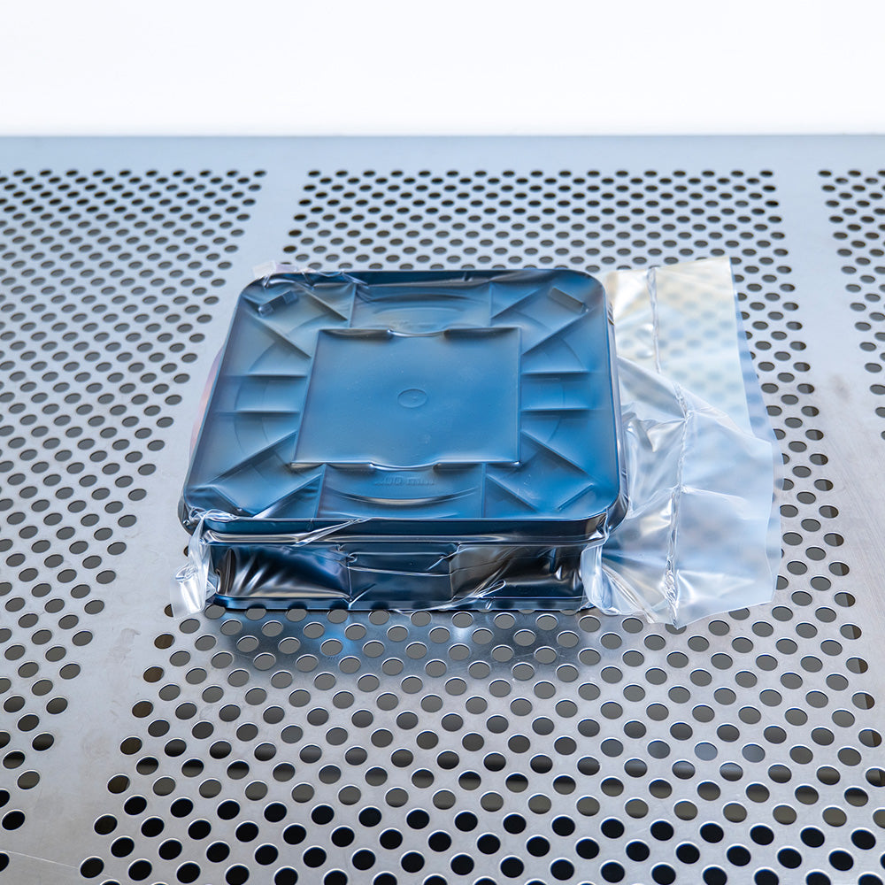 Vacuuum sealed LDPE bag with eLX canister inside in cleanroom