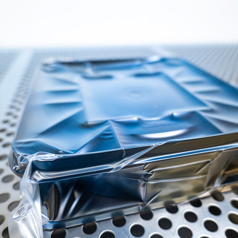 Close up of eLX canister in a vacuum sealed LDPE bag