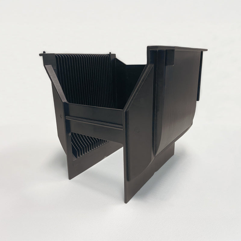 front-side view of a black semiconductor process cassette with a clear view on the 25 slots