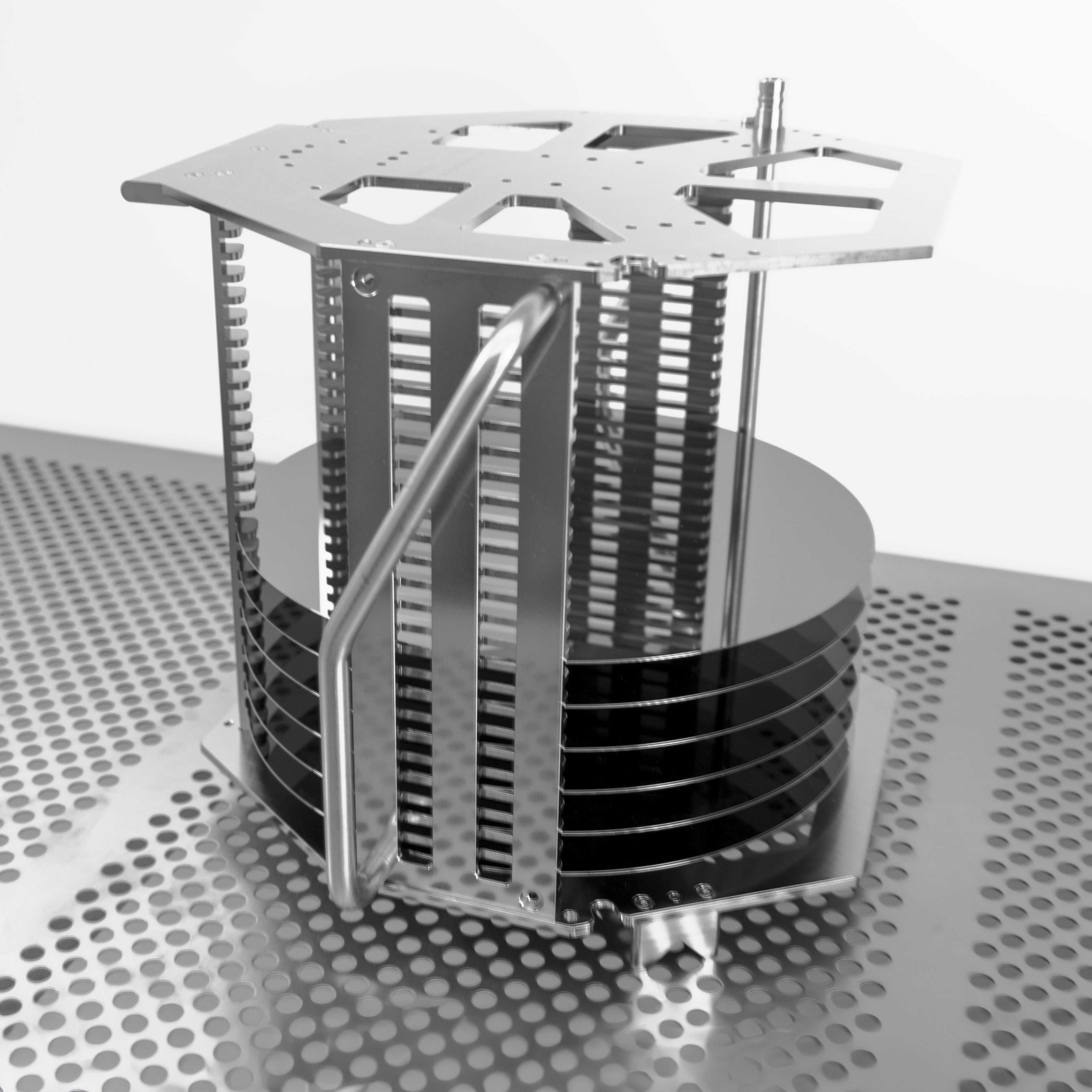 FOUP style stainless steel cassette filled with semiconductor wafers in cleanroom