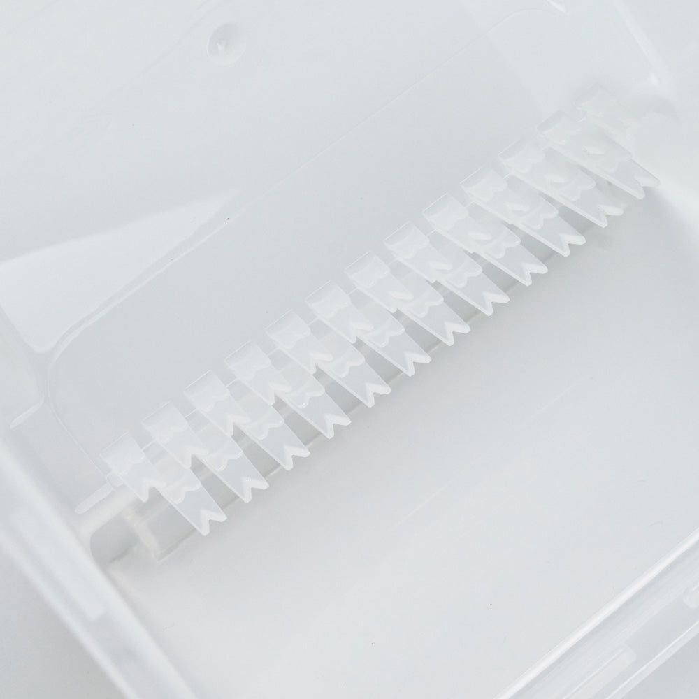 Close-up of edge-grip fixture for silicon carbide wafers