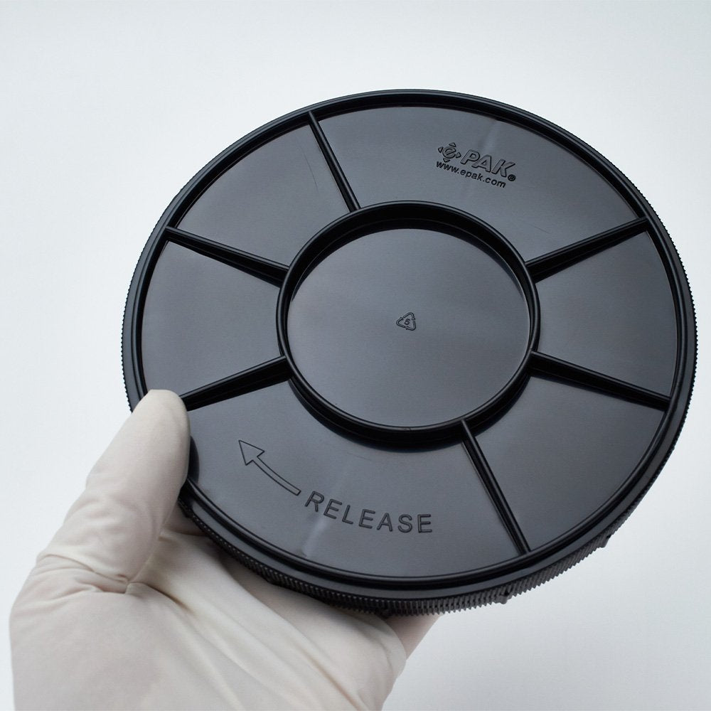 Closed 6 inch Conductive polypropylene coin style shipper in cleanroom setting